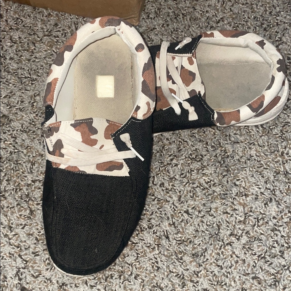 Brown cow print slides (hey dudes knockoffs)